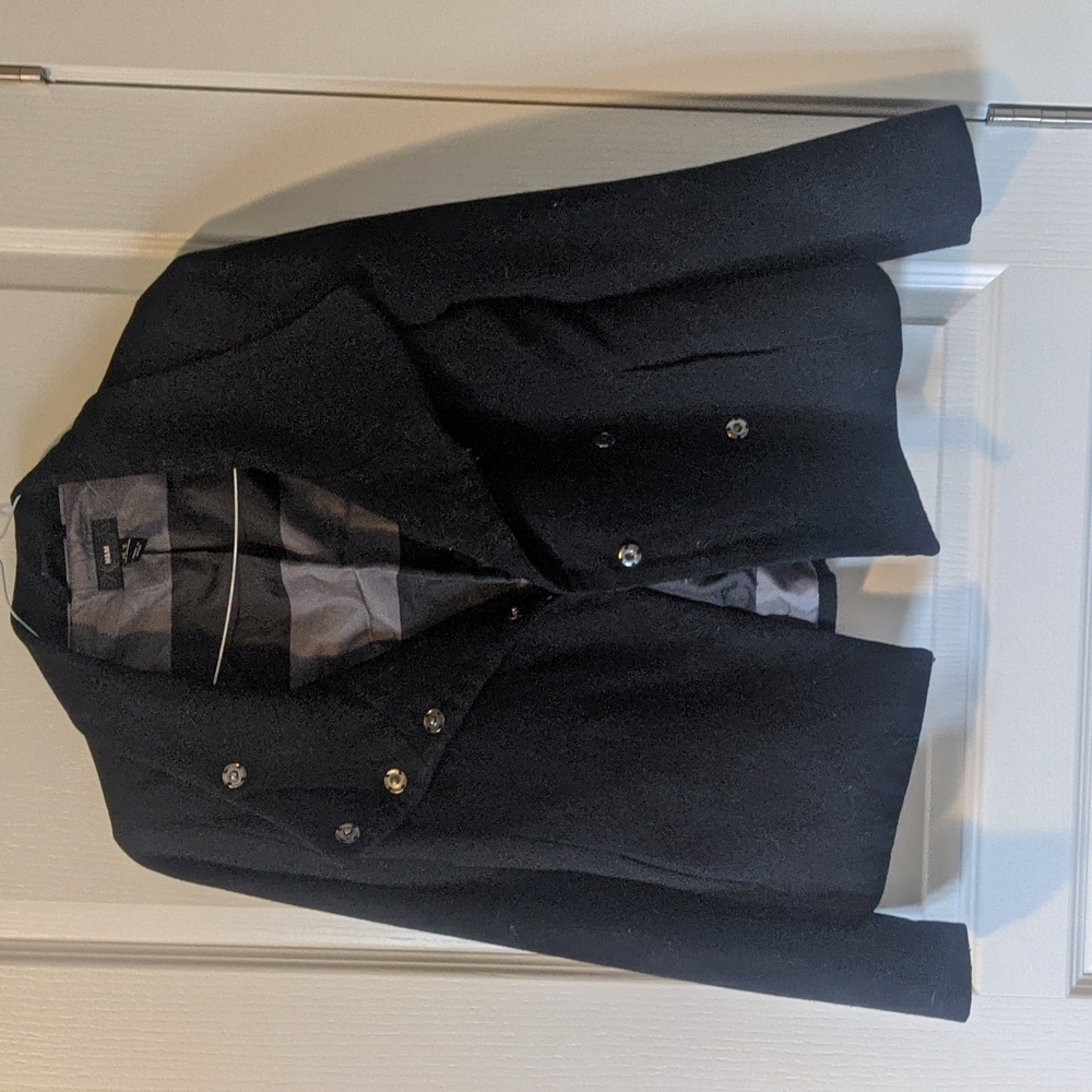 Black short peacoat.